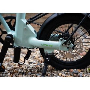 Detail of the E-Go Lite 3S kickstand, mid-drive motor housing, and rear brake rotor.