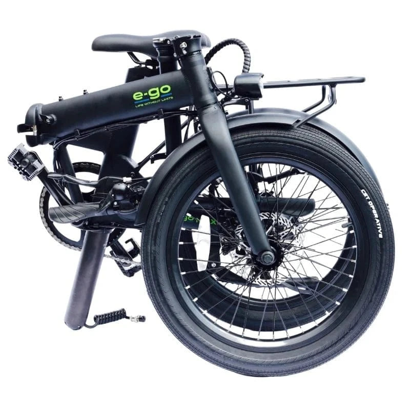 Side view of the satin black E-Go Max electric bike fully folded, demonstrating its compact dimensions for easy storage in car boots, caravans, or public transport.