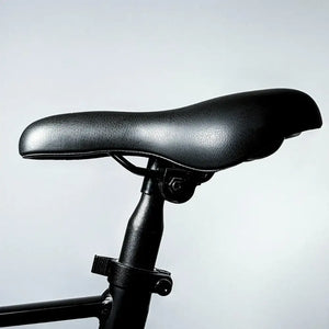 Close-up of the padded, comfortable saddle and seatpost of the EMovement Panther V4.2.