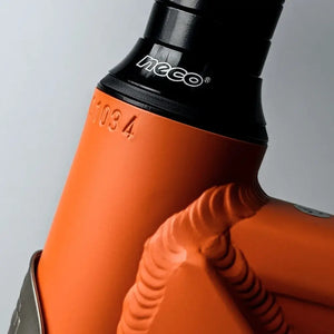 Close-up showing the frame weld quality and headset area on the orange EMovement Thunder V4.2.