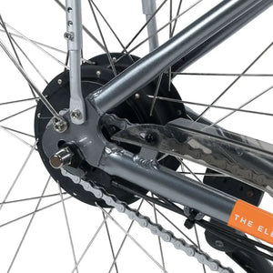 Rear frame dropout, chain, and axle nuts on the Emu Classic electric bike.