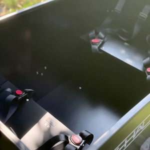 Emu E-Haul cargo box interior with bench seats and child seat belts