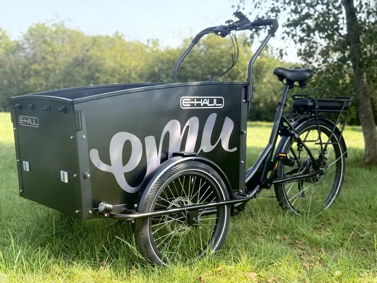 Emu E-Haul electric cargo trike with front cargo box, three-quarter view