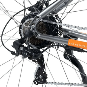 Detail view of the Shimano derailleur, cassette, and rear hub motor on the Emu Evo Crossbar bike.