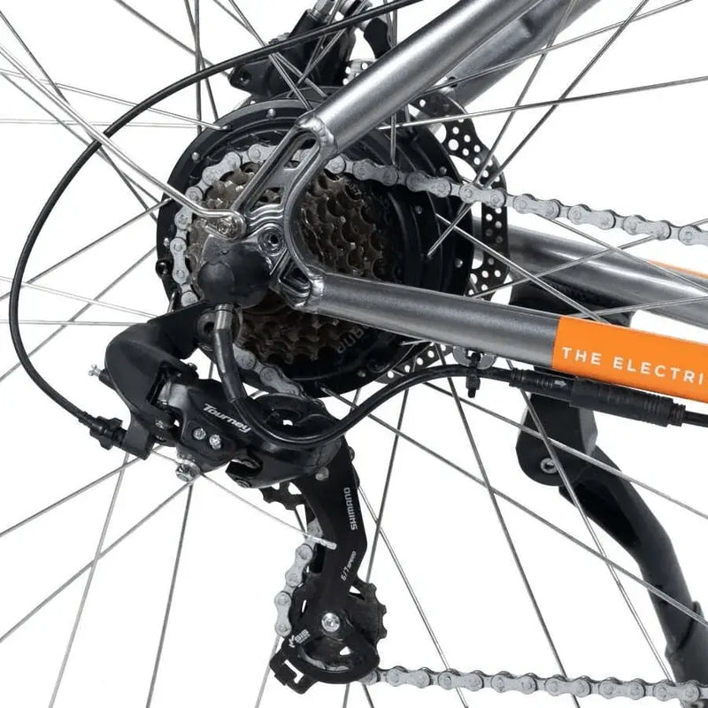 Detail view of the Shimano derailleur, cassette, and rear hub motor on the Emu Evo Crossbar bike.