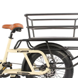 Rear pannier rack detail on the cream EMU Longtail cargo electric bike with hydraulic disc brake.