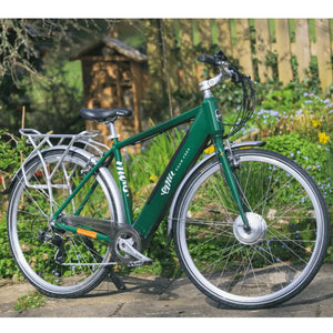 Green Emu Roam Crossbar electric bike parked on a stone patio in a scenic garden environment.