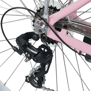 Detail shot of the Shimano Tourney TX rear derailleur and 7-speed drivetrain on the pink Emu Roam electric bike.