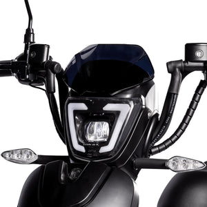 Front view of the Eskuta SX-250 LED headlight and tinted windscreen