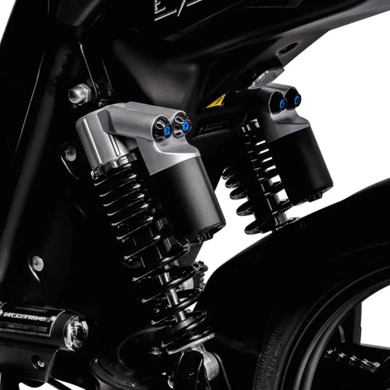 Dual rear suspension system on the Eskuta SX-250 Series 4 electric bike for enhanced comfort on urban roads.
