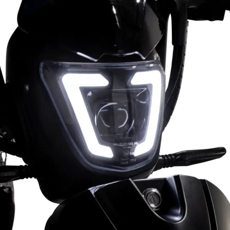 Bright LED front headlight on the Eskuta SX-250 Series 4 electric bike for improved visibility and safety.