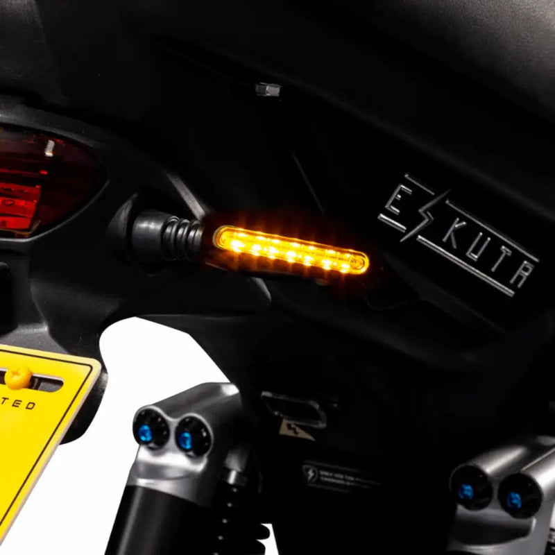 Rear LED indicator light on the Eskuta SX-250 Series 4 electric bike for increased road visibility.