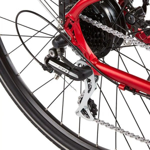 Close-up of the Shimano Acera rear derailleur on the red EZEGO Commute EX, ensuring smooth shifting across the 8-speed cassette for city riding.