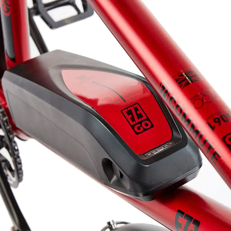 Close-up of the removable 400Wh external battery pack mounted on the downtube of the red EZEGO Commute EX, showing the charging port and secure locking mechanism.