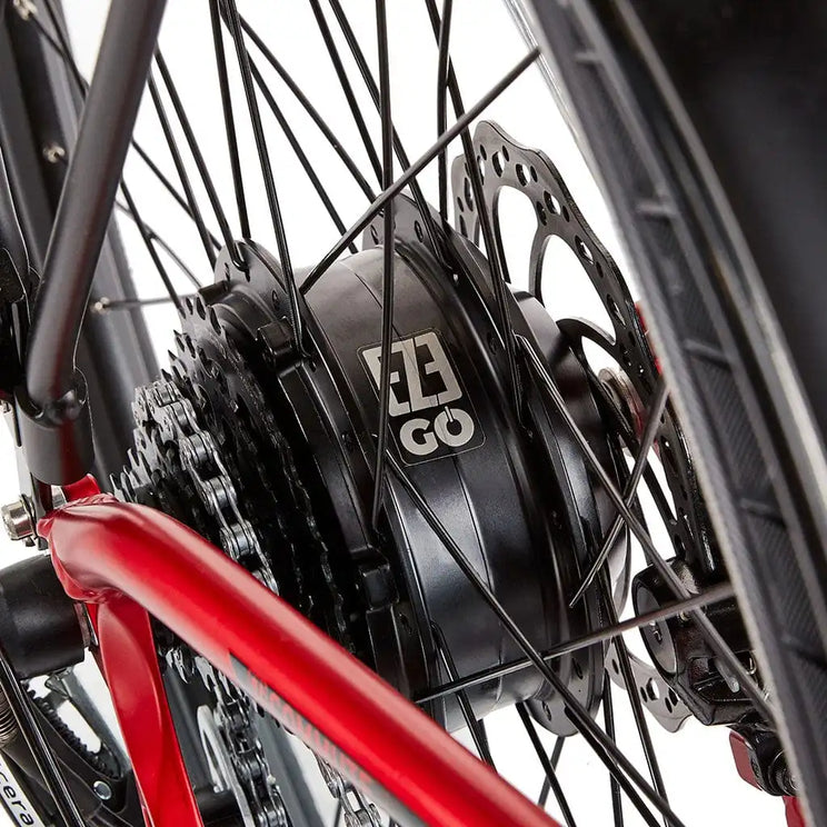 Detail view of the 250W rear hub motor on the EZEGO Commute EX gents bike, highlighting the disc brake rotor and black spokes for urban durability.