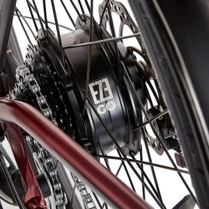 Close-up of the branded EZEGO 250W rear hub motor, providing reliable electric assist for the Commute Ex ladies bike.