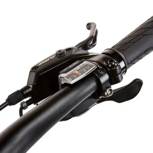 Digital LCD display mounted on the handlebars of the EZEGO Commute Int gents, showing essential ride data like speed and battery life next to the control buttons.