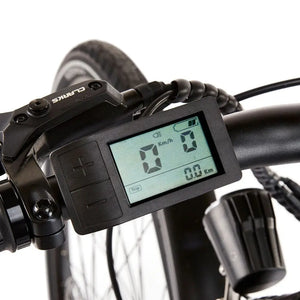 Digital LCD display mounted on the handlebars of the EZEGO Commute Int, showing essential ride data like speed and battery life next to the control buttons.