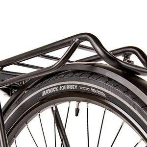 Close-up of the Kenda Kwick Journey puncture-resistant tyres and the sturdy rear pannier rack on the EZEGO Commute Int, designed for carrying luggage.