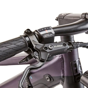 Handlebar controls on the EZEGO Commute Int, featuring Shimano Acera 8-speed gear shifters and Clarks hydraulic brake levers for precise control.
