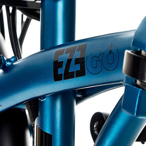 The "EZEGO" and "6061 Superlight" aluminium branding on the seat tube of the blue Fold electric bike.