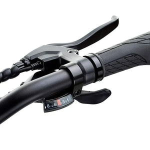 Close-up of the Shimano 8-speed gear shifter and ergonomic handlebar grip on the EZEGO Fold electric bike.