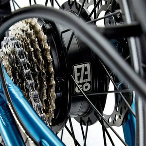 Detail shot of the 250W rear hub motor and gear cassette on the EZEGO Fold electric bike wheel.