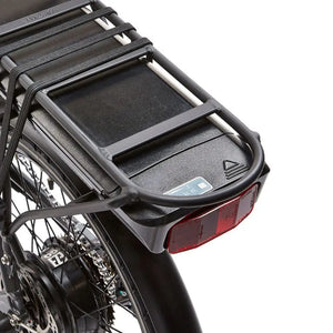 Close-up of the rear luggage rack and integrated battery compartment on the EZEGO Fold electric bike.