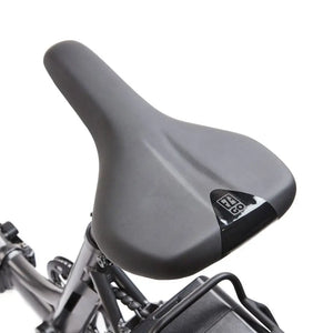 Comfortable black saddle with EZEGO branding on the Fold Low Step electric bike.