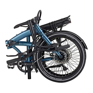Side view of the blue EZEGO Fold electric bike fully folded down to demonstrate its compact size for storage and transport.