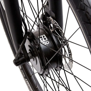 Close-up of the EZEGO branded 250W front hub motor on the Step NX electric bike wheel.