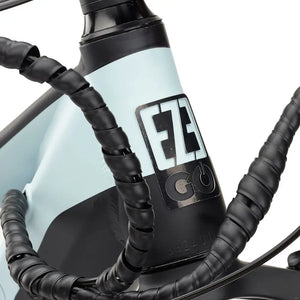 Close-up view of the EZEGO Trail Destroyer II electric mountain bike's headtube with logo and cable wrap, viewed from the left side.