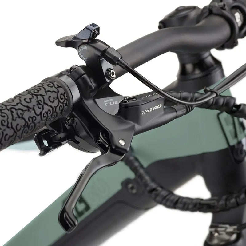 Close-up of the left brake lever and Shimano CUES shifter on the EZEGO Trail Destroyer II e-MTB, mounted on a textured black handlebar.