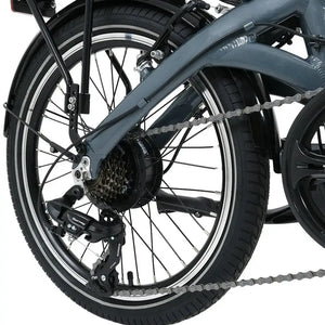 Falcon Compact electric folding bike 250W close-up of rear wheel showing hub motor, cassette, and Shimano drivetrain components.