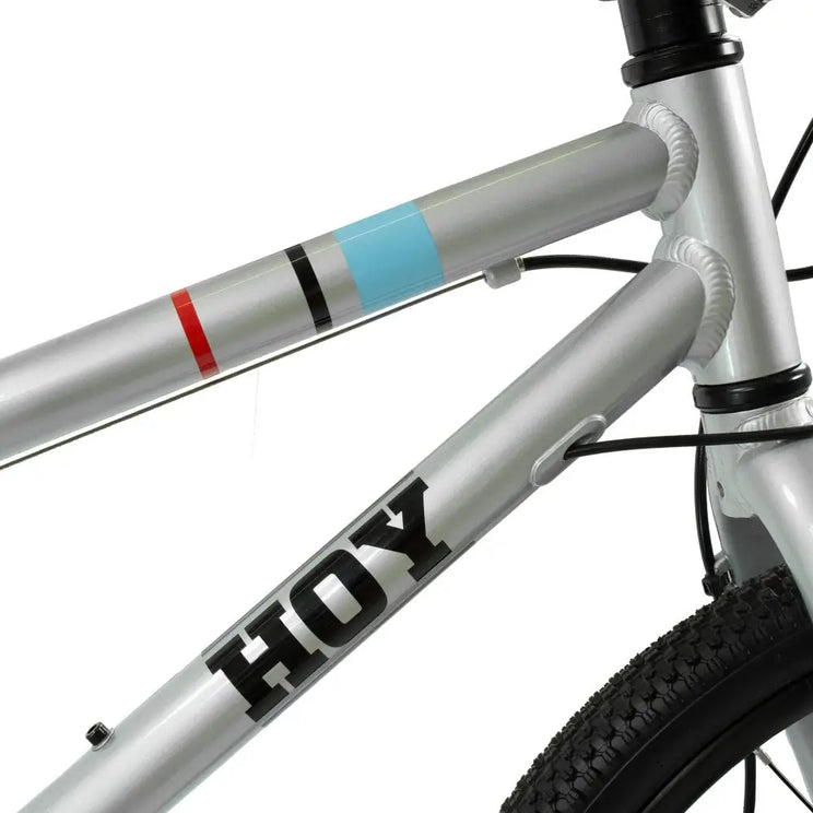 Detailed shot of the HOY logo and iconic coloured stripes on the silver frame downtube of the Pentland 20-inch bike.
