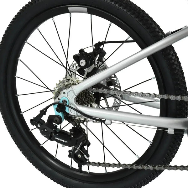Close-up of the Shimano Tourney 7-speed rear derailleur and cassette on the HOY Pentland 20" kids' bike.