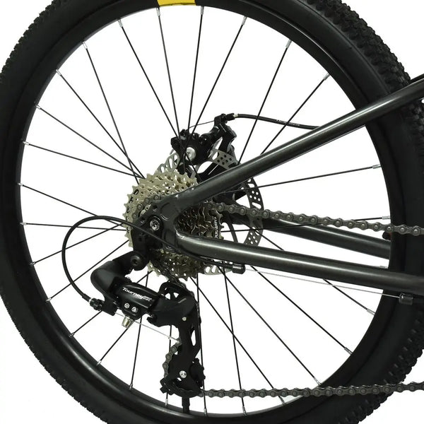 Close-up of the Shimano Tourney 7-speed rear derailleur and cassette on the HOY Pentland 26" kids' bike.