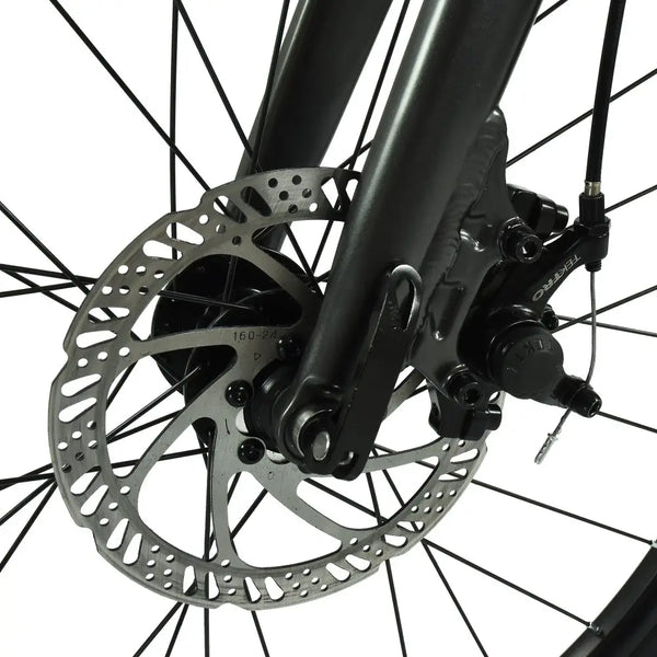 Close-up of the Tektro mechanical disc brake caliper and rotor on the HOY Pentland kids' bike.