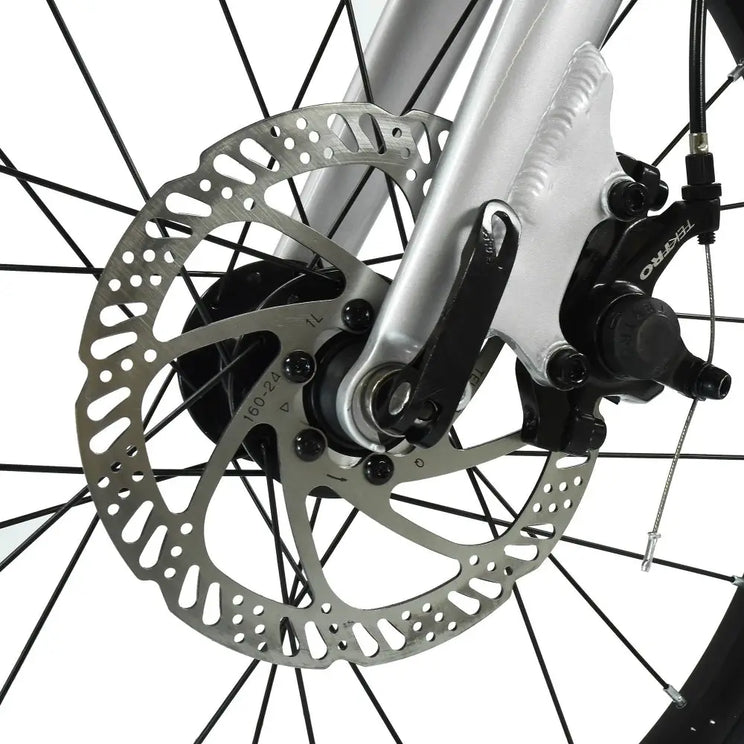 Close-up of the Tektro mechanical disc brake caliper and rotor on the HOY Pentland kids' bike.