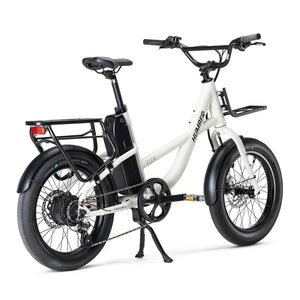 Rear view of white Humber Flex electric bike with rear rack and front basket rack.