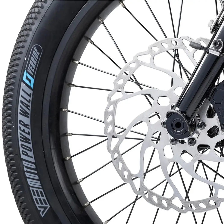 Close up of the Humber Flex LT front disc brake and Vee Tire Power Wall tyre.