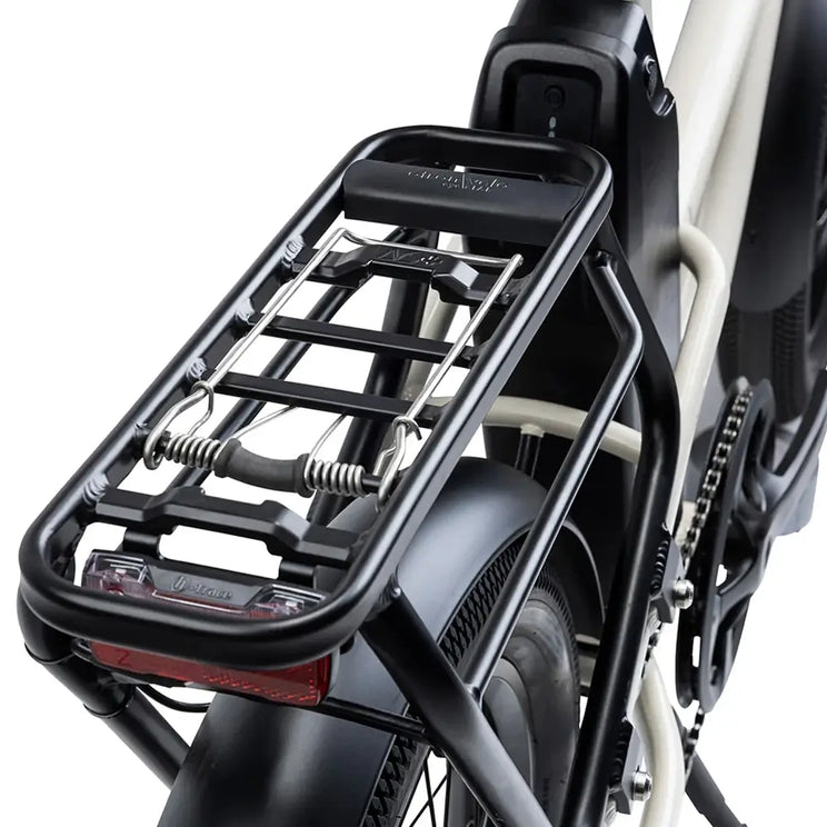 Rear cargo rack and integrated battery on the Humber Flex electric bike with built-in rear light.