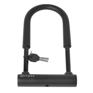 Close-up of the Hygge D-Lock with keys, designed for high-security bicycle locking with a durable and robust build.
