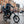 Rider using Hygge Herlev electric bike with child seat in city street showing family commuting use.