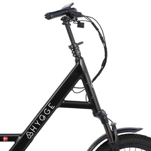 Hygge Herlev e bike handlebar and folding stem detail showing adjustable height and compact design.
