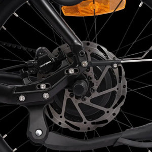 Hygge Herlev electric bike Tektro disc brake close up showing rear braking system and hub motor detail.