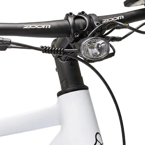 AXA LED headlight mounted under the stem of the Hygge Lossø commuter electric bike.