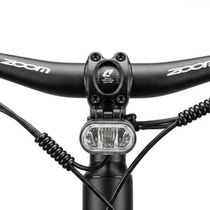 Front view of the Hygge Lossø cockpit with the Zoom handlebar, stem and AXA LED headlight.