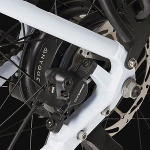 Close-up view of the disc brake system on the Hygge Lossø Commuter Hybrid Electric Bike 250W.