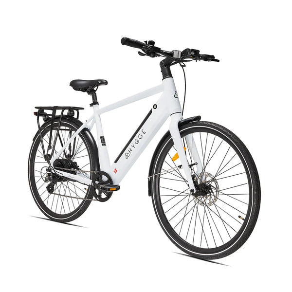 Angled front view of the Hygge Lossø commuter e-bike, highlighting the front wheel, disc brake, and minimalist frame design.